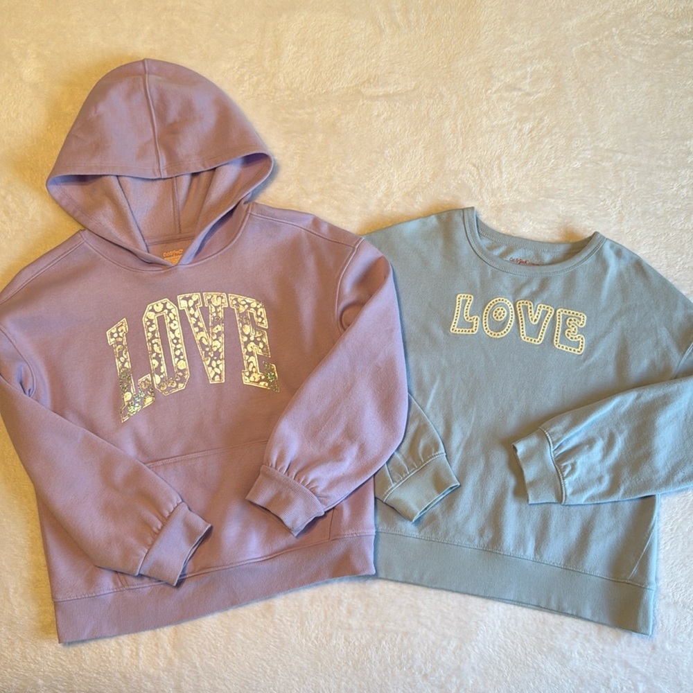 Two LOVE Cat & Jack girls sweatshirts. Size 10-12.